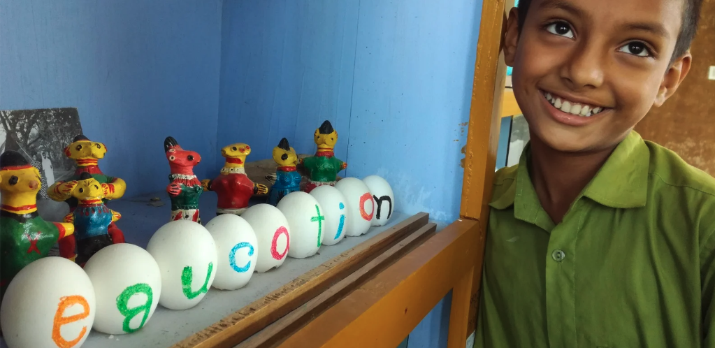 Child with education eggs